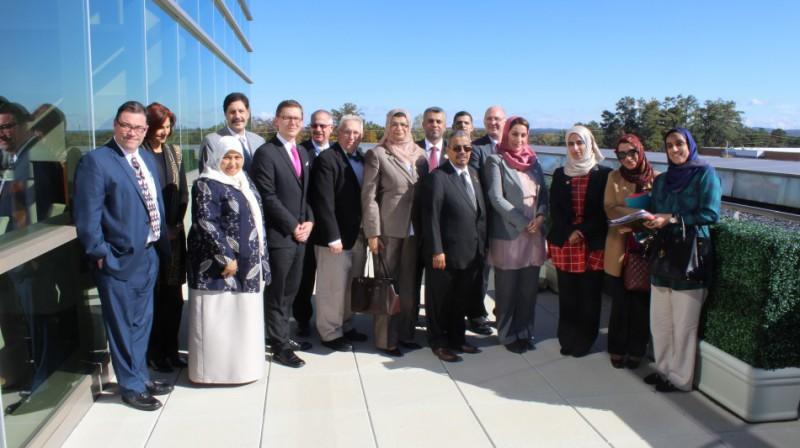  / Omani delegation with conference organizers.