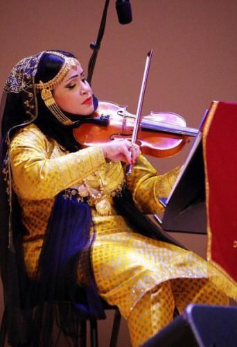  / Radhiyah Bint Abdulla Al Ibeidaniya, violinist with Oud Hobbyist Association.