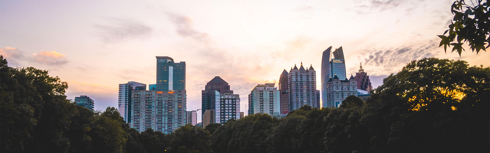 The Atlanta skyline against water and trees