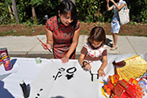 photo of mother and daughter doing crafts