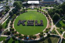 drone view of students gathered in a group spelling out KSU