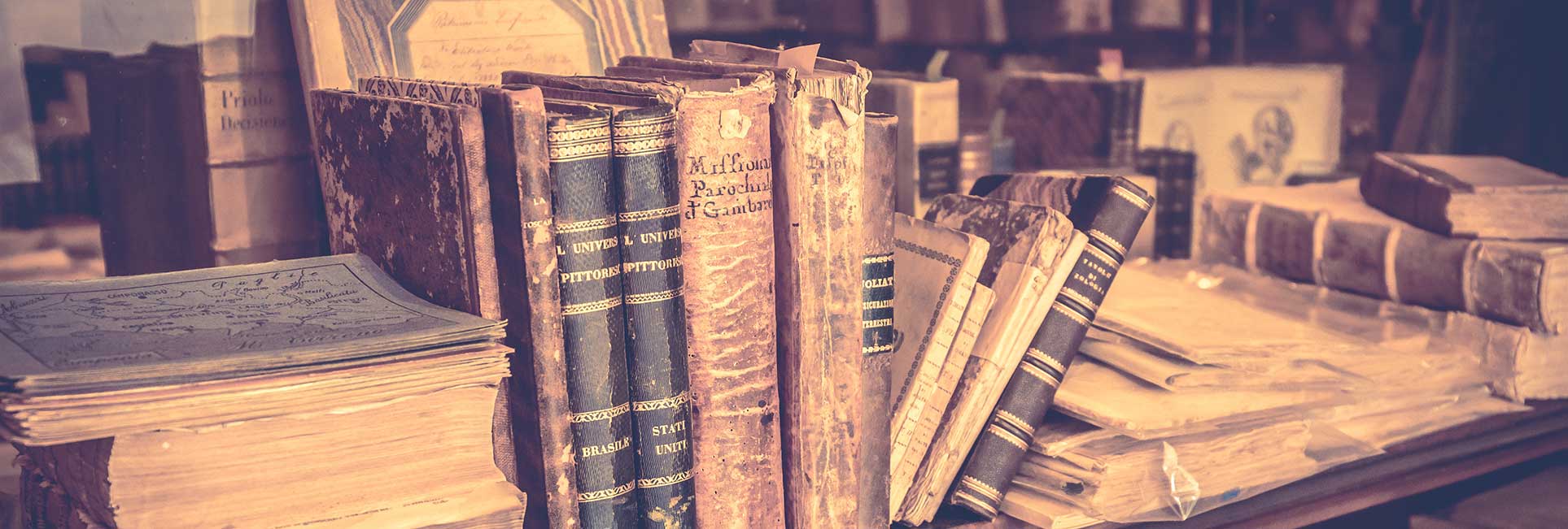 photo of old books in italian library