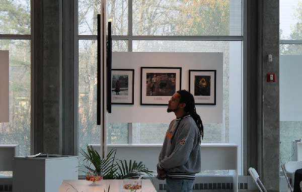 photo of KSU global affairs student viewing exhibit