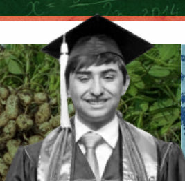 Male student smiles at commencement in cap and gown