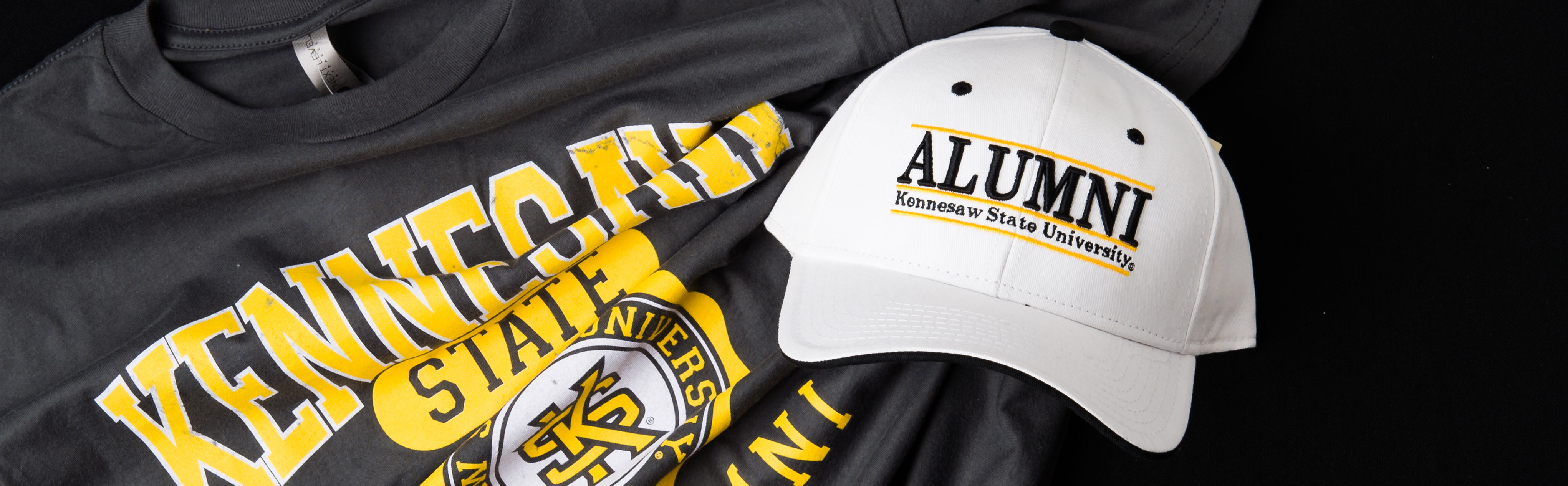 ksu students wearing merch smiling