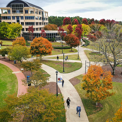 ksu in the fall with students walking to class
