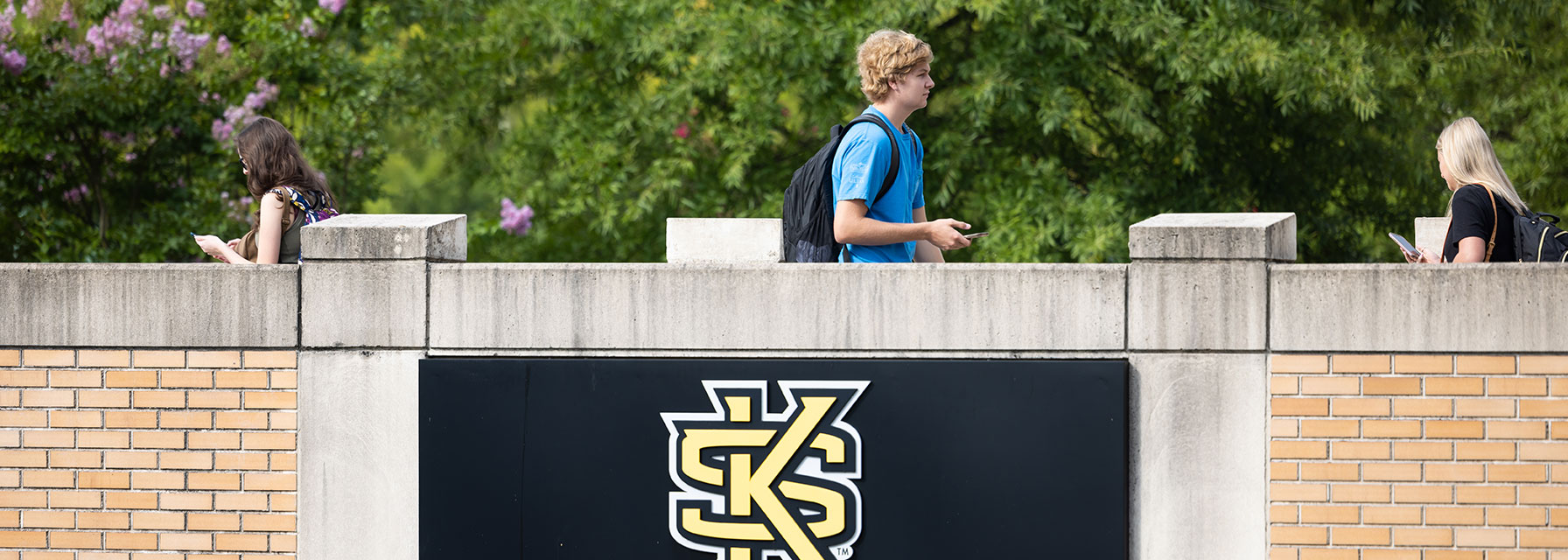 Residential students walking from their residence community to campus