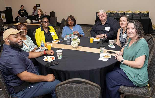  / guests and honorees at table
