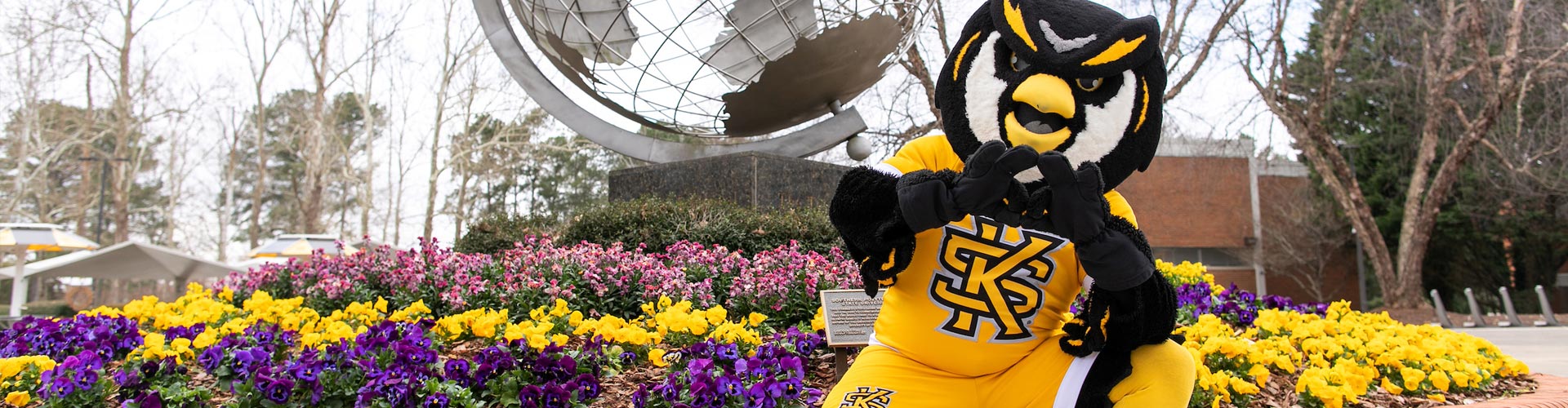 Scrappy in front of the Globe on the Marietta Campus