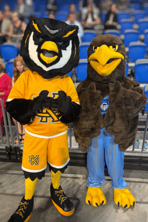 KSU mascot Scrappy stands side-by-side with Chatt Tech's mascot