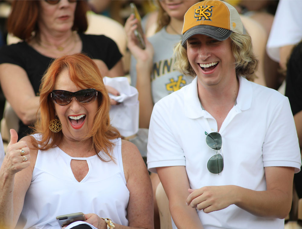 Parent and students at KSU football game