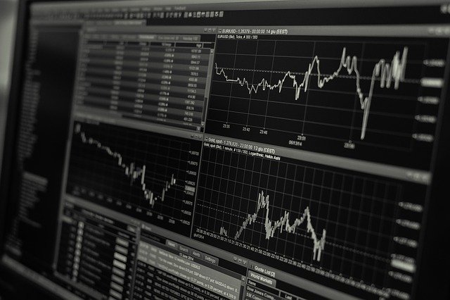 computer screen showing graphs and data.