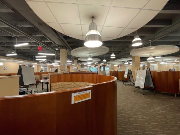 Grop seating on the first floor of Sturgis Library with whiteboards