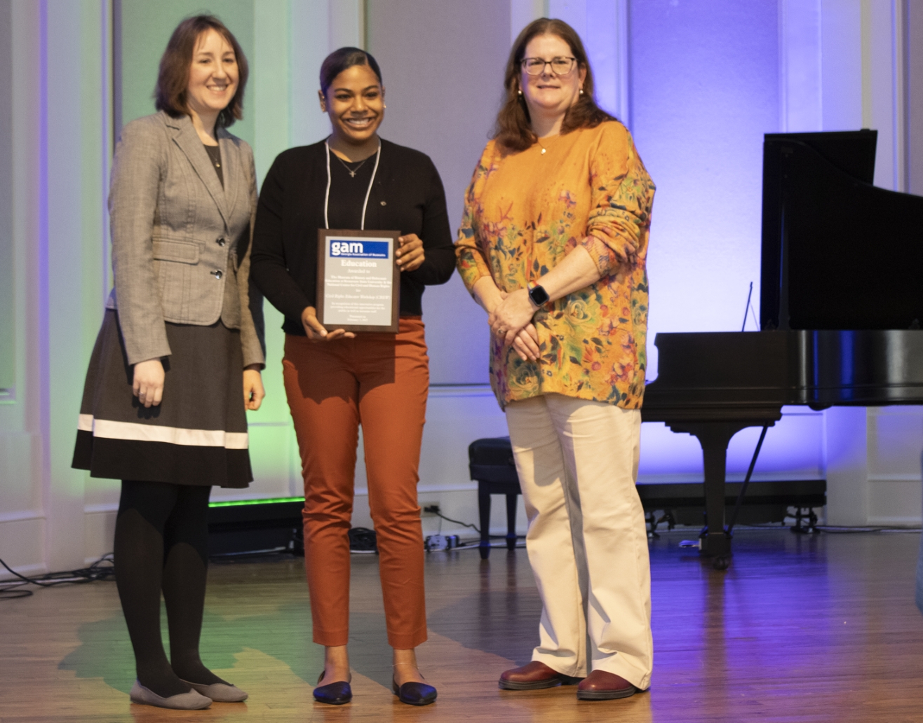 Ashley Accepts GAMG Award