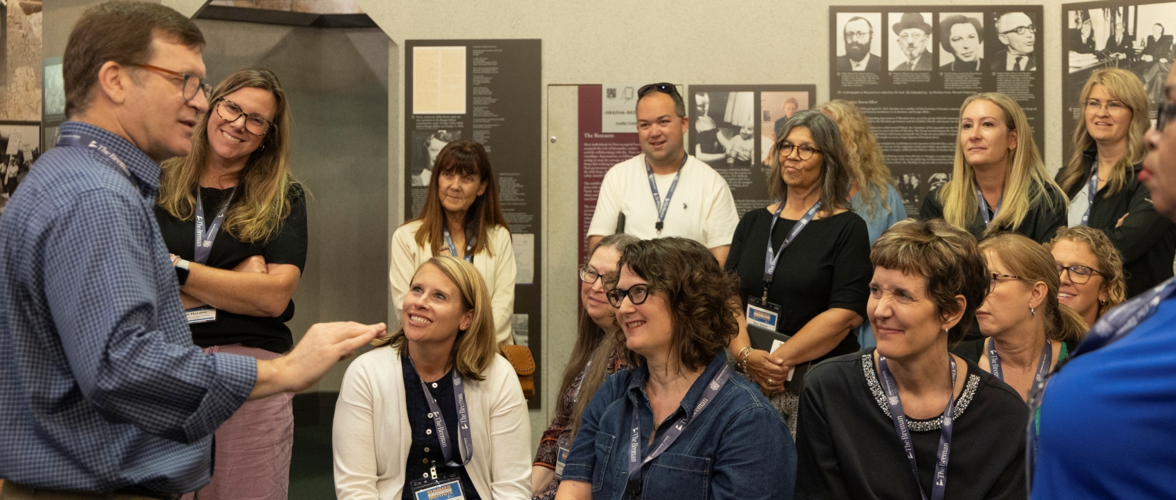 A group of teachers listening to a lecture during the Summer Institute.