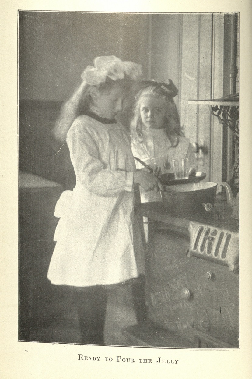 little girls cooking jelly