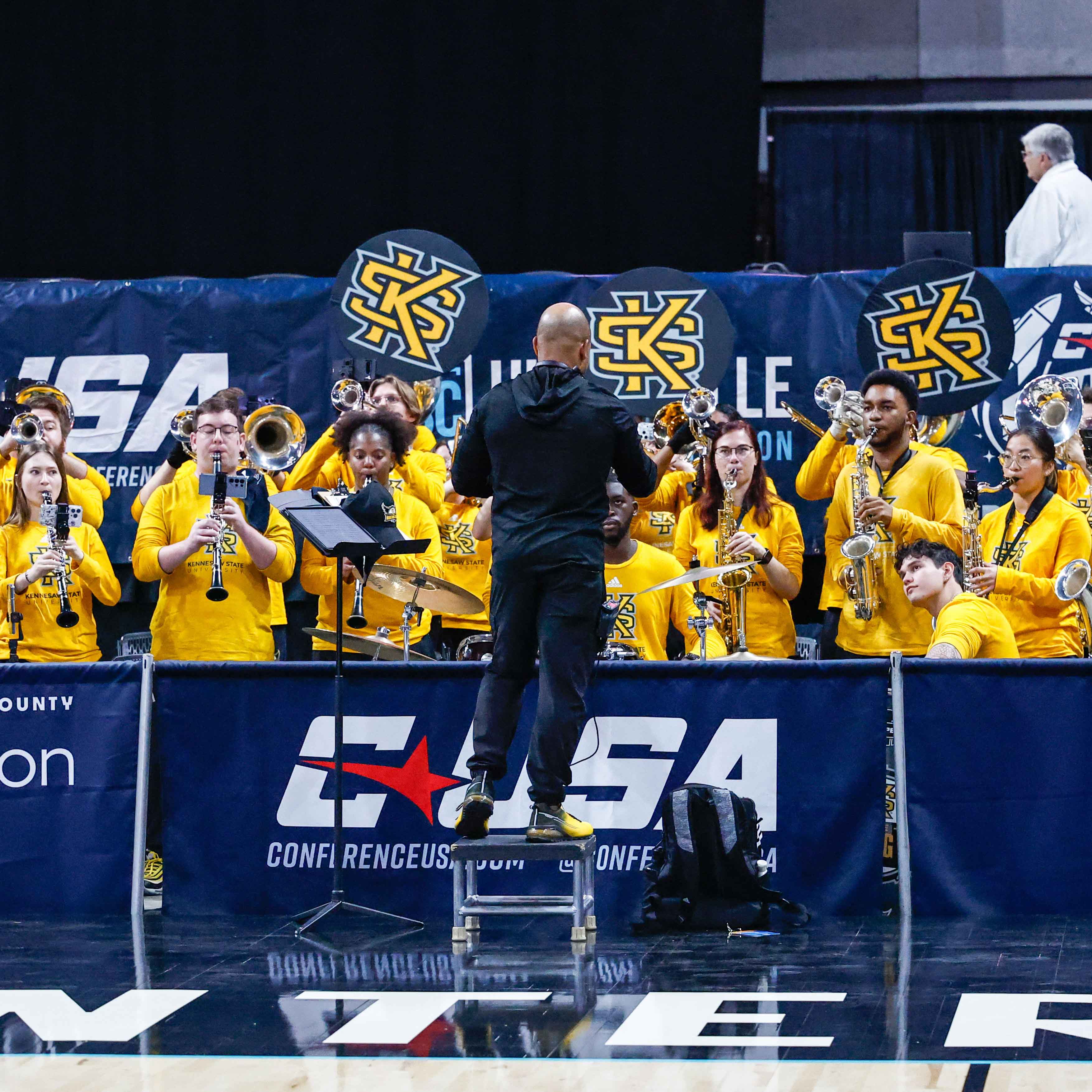 branding meeks posing with ksu band in rehearsal