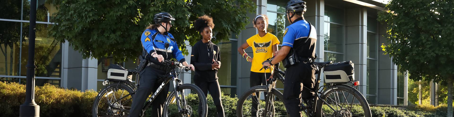 KSU PD bicycle officers and students