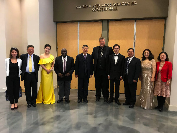 Entire Delegation standing in front of the concert hall doors.