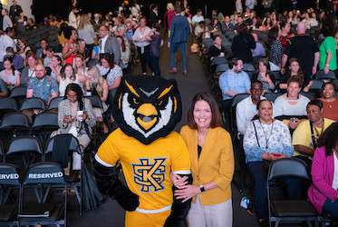 President Kathy Schwaig and Scrappy the Owl