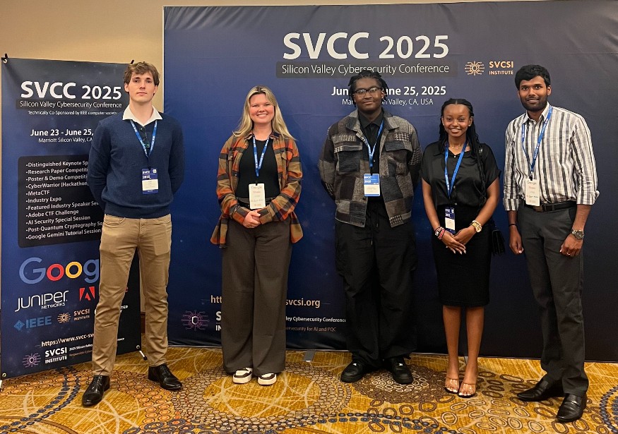 Maxwell Bradley, Cassidie Grogan, Christopher Forrester-Jack, Lisa Thiongo, Manohar Raavi at the cybersecurity conference.