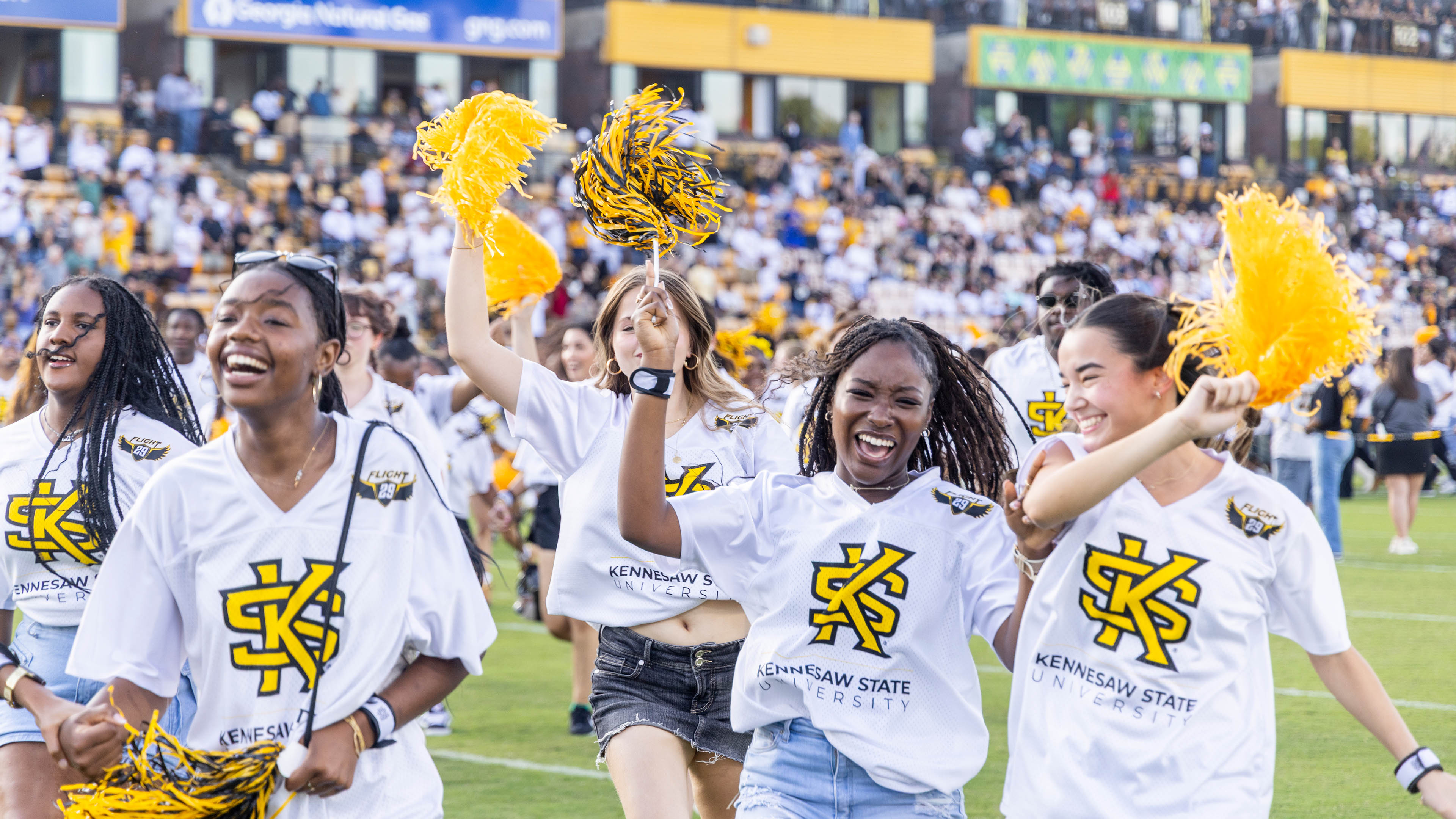 ksu students cheering outside of sports event