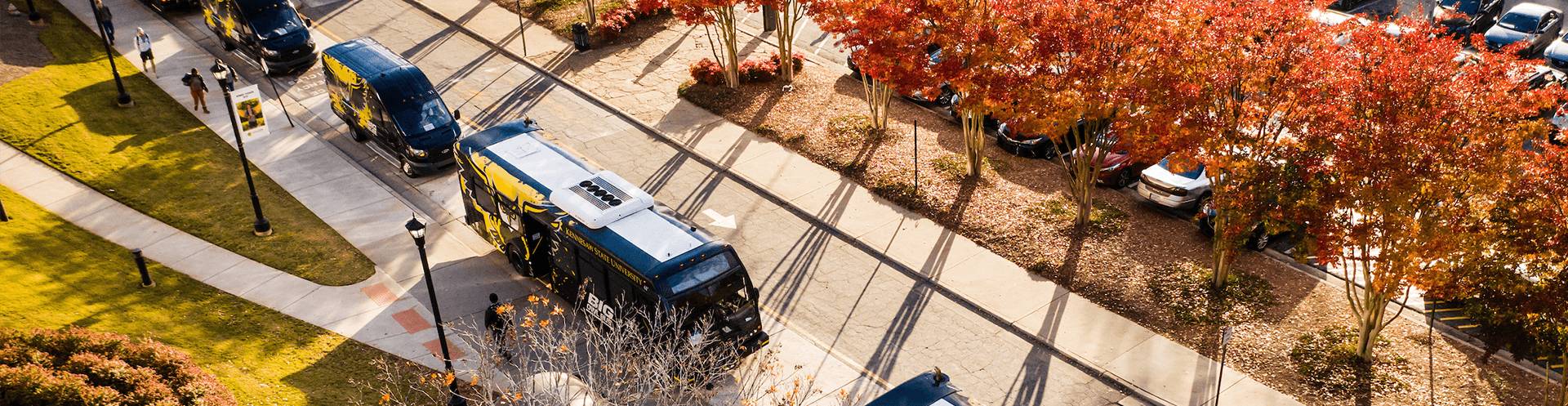 aerial shot of big owl bus on kennesaw campus