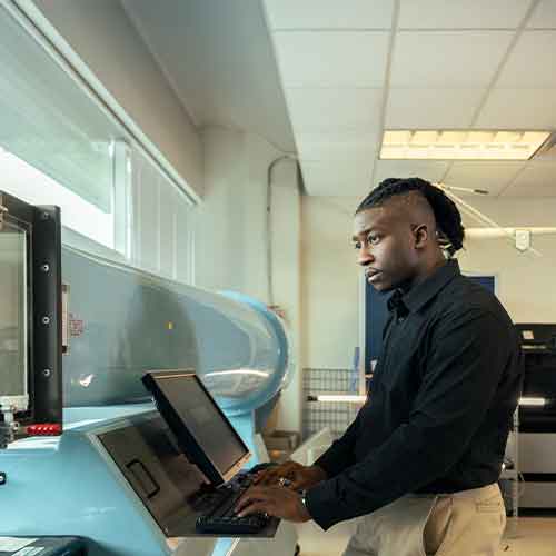ksu aerospace student working on a project.