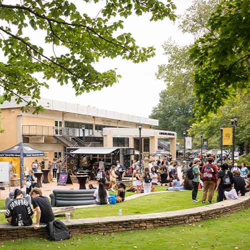 large group of students at scrappy hour event.