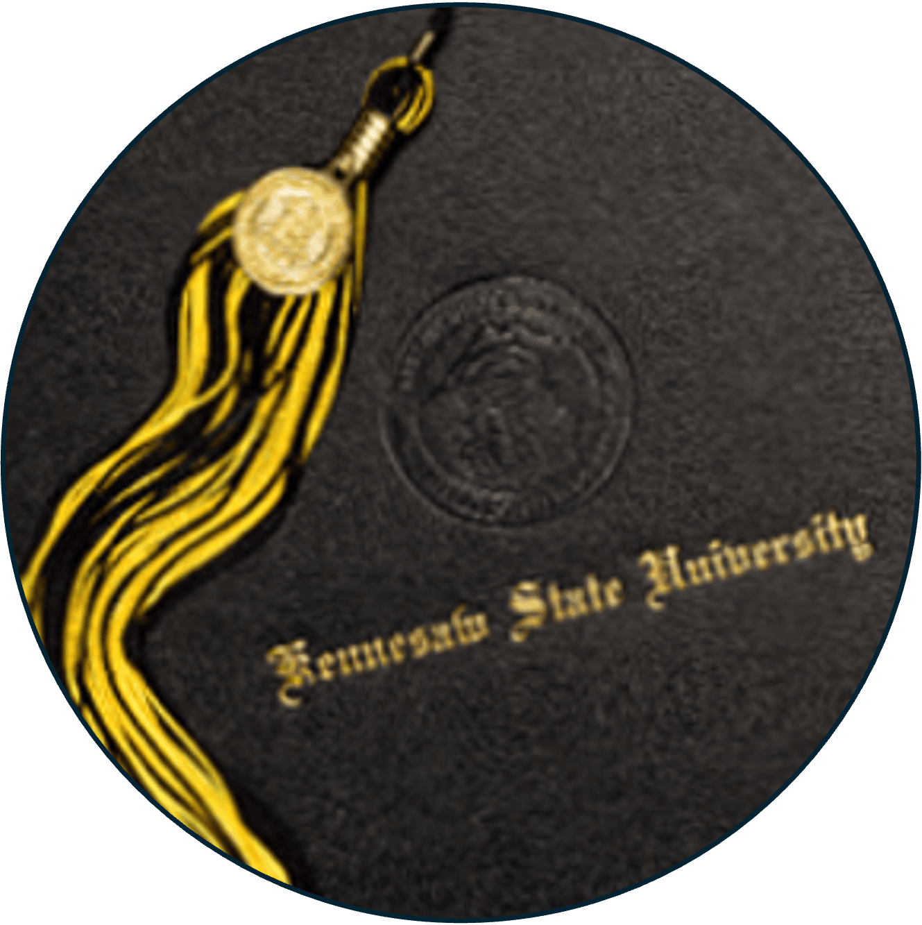 close up of ksu cap with yellow tassel