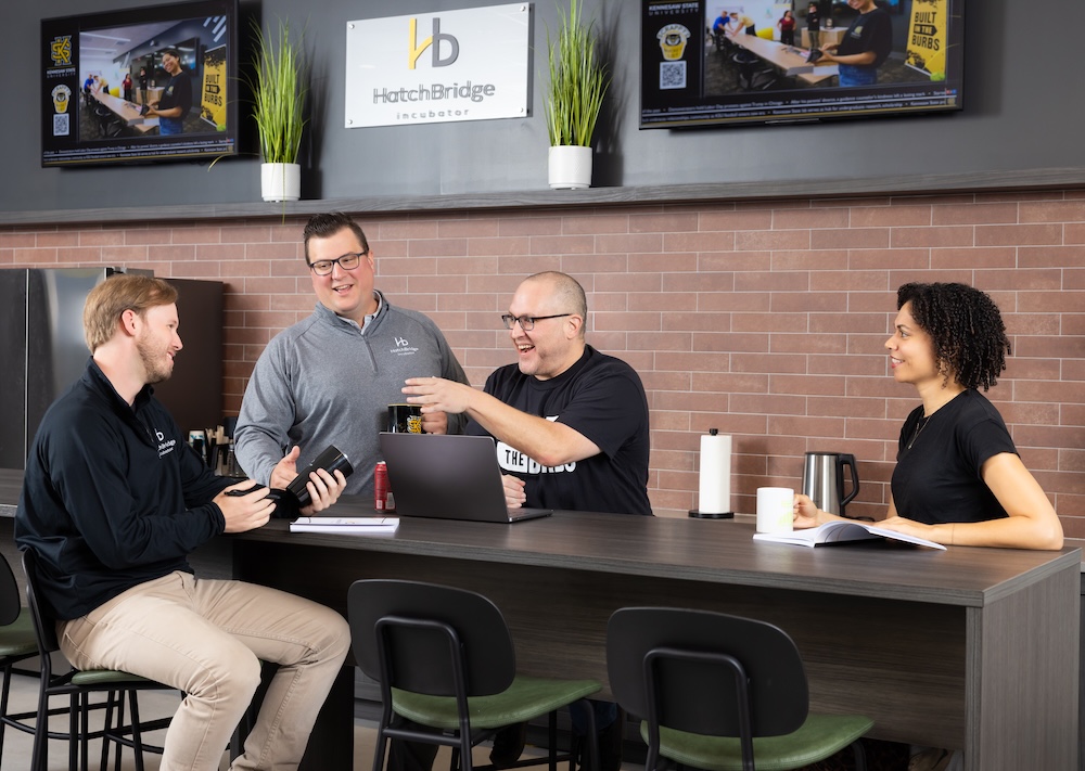 group of people collaborating at a table.