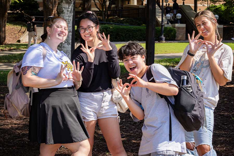 group of ksu students smiling for picture.