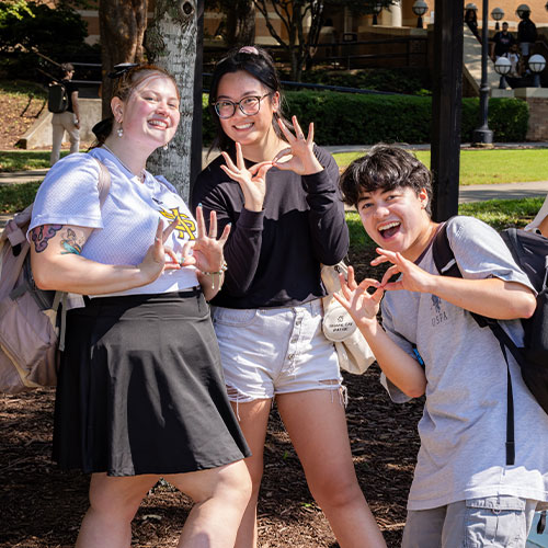 group of ksu students smiling for picture.