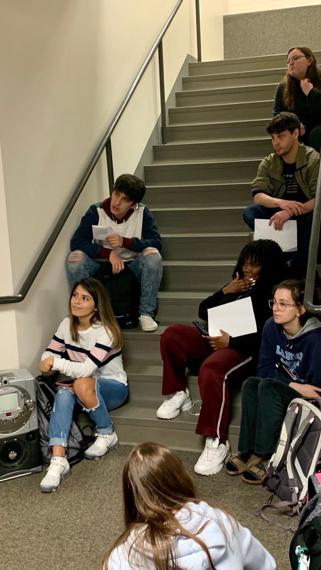 Students Look On During the Poetry Reading  / Students Look On During the Poetry Reading 