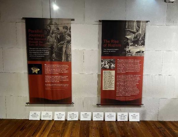 Two banners displaying historic information