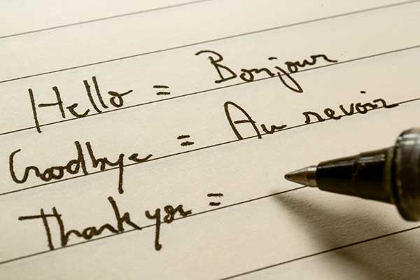 french translations written on paper
