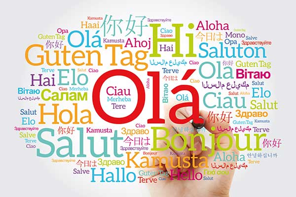 hand writing hello in many different languages