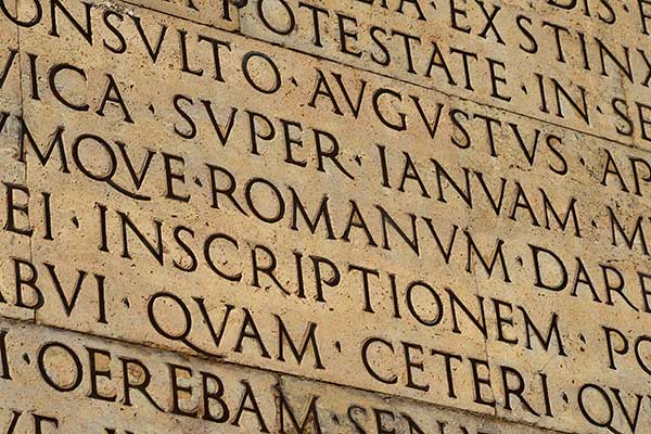 latin engraved in ancient stone