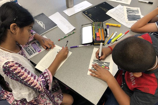 Elementary students writing