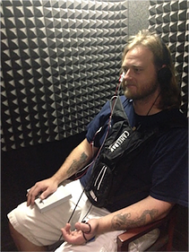 person in sound booth