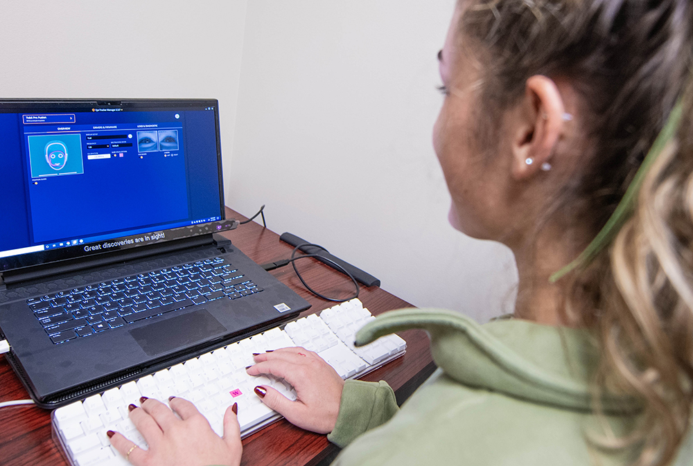 Student at laptop in the KSU Psychology Lab