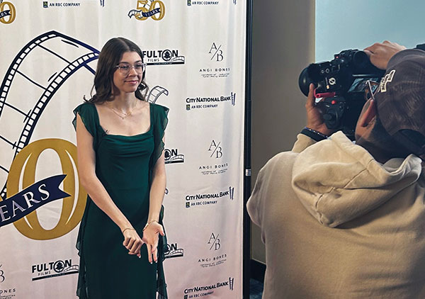 KSU Senior Brianna Barros has a moment in the spotlight at the WIFT 50th Anniversary Gala.