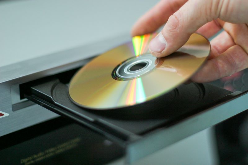 DVD being inserted into a dvd player