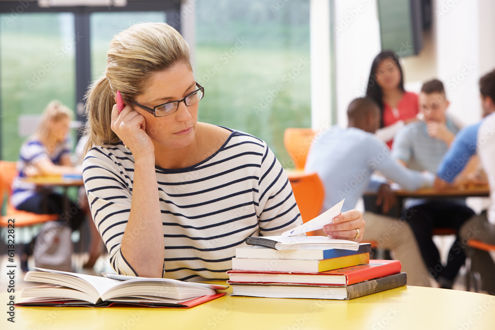 mature student reading a book