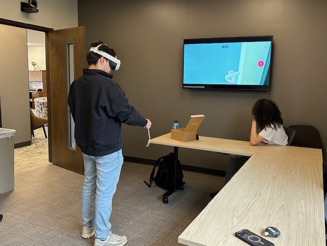 students utilizing virtual reality headset