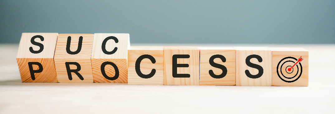 success and progress spelled in blocks