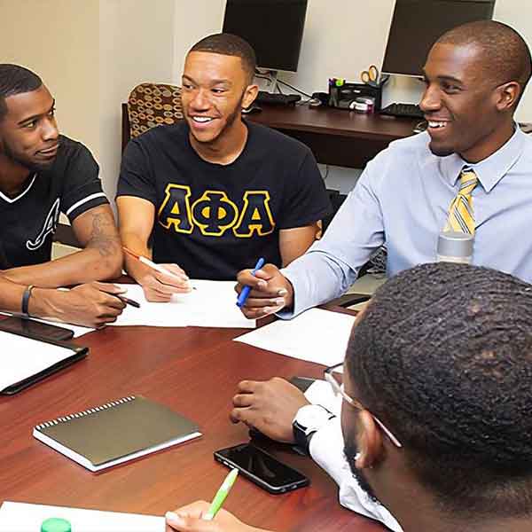 KSU students at the african american male initiative collaborating.