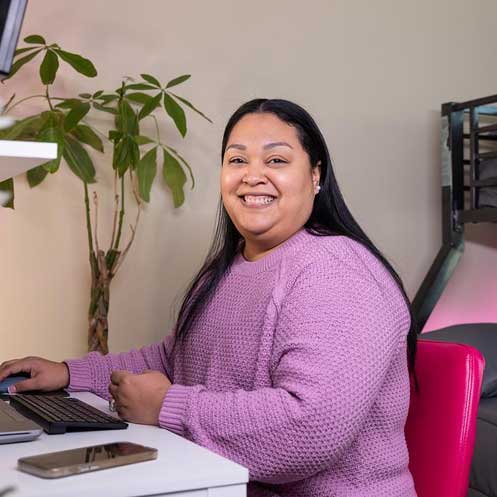 ksu human resources rep sitting at computer