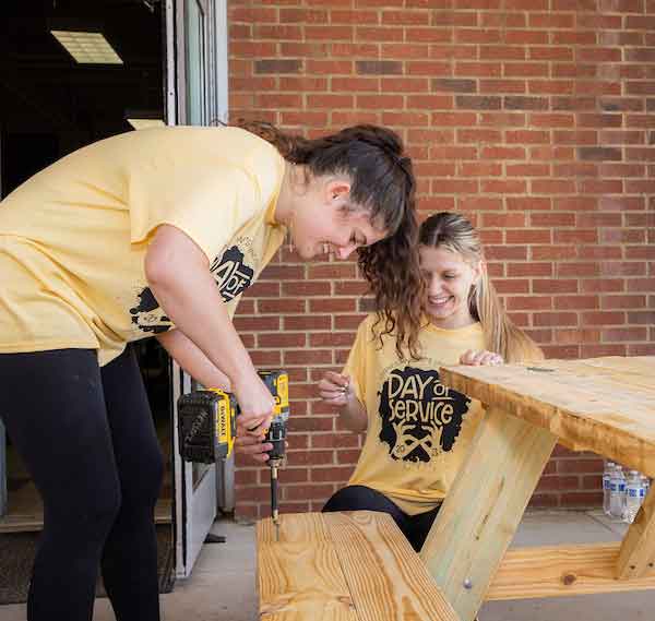 students constructing a table