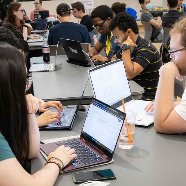 Group of KSU students using their computers.